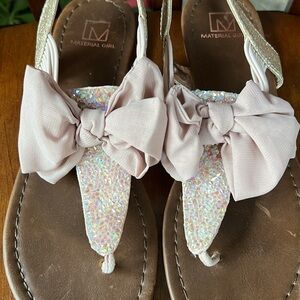 Material Girl blush flat sandals with bows and sequins. Size 8.5 elastic strap
